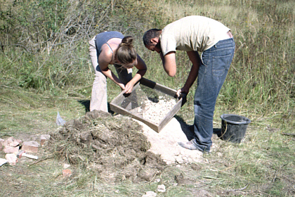 Carine and Augusto siffing the earth