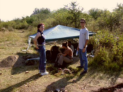 Tara and Fabio watching the others work
