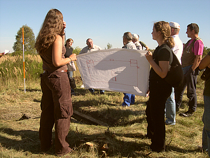 Carine and Marlen holding up the drawing