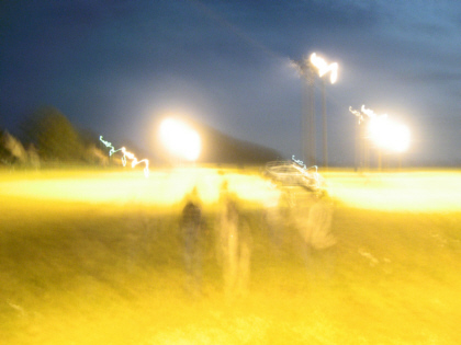 impression of us walking across the field at night